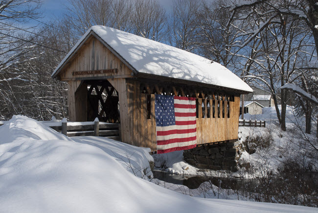 New England Snow Covered Bridge With US Flag.