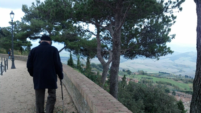 Elderly Patient Walking With a Cane.