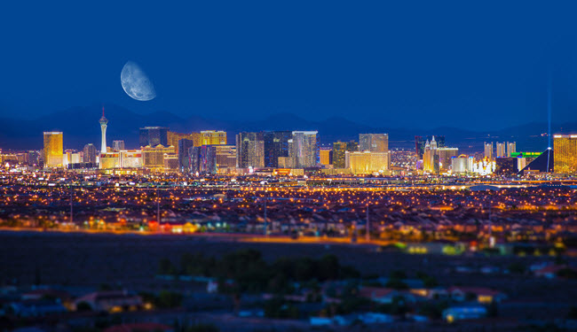 Las Vegas Strip at Night, With Moon in the Background.